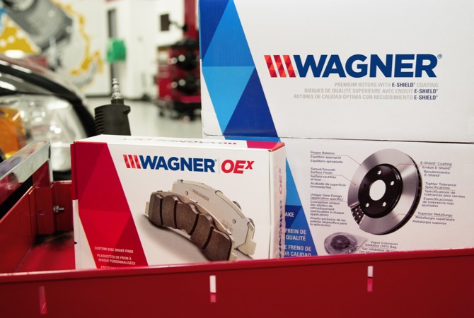 Store display of Wagner OEX brake pads and Wagner E-Shield Rotors.